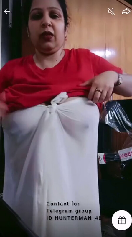 Hot Aunty Showing Big Boobs In Transparent Clothes On Tango Live